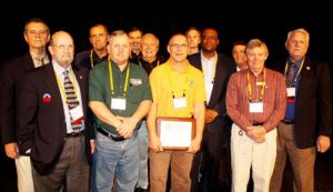 HVACR educators being recognized for earning programmatic accreditation, during the National HVACR Educators and Trainers Conference.