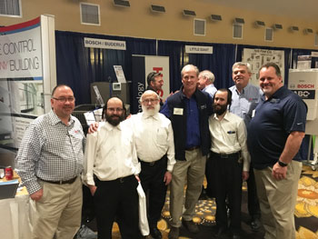 Left to right: George Wehnert, Moses Weisz, Joe Weisz, Jim Luce, David Weisz, Rich Rogers and Eric Hostettler.