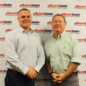 Richard Eppers, left, COO, with Jerry Hall, right, president and owner of Assured Comfort.