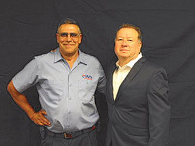 Gus Suarez, founder of Gus HVAC (left) with Jerry Hall, owner of Assured Comfort Heating, Air & Plumbing.