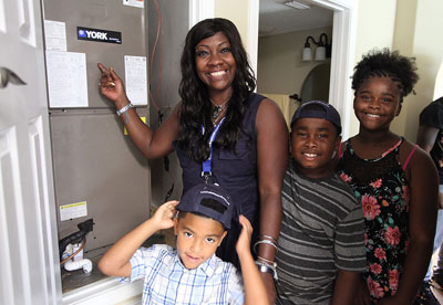 Gold Star Wife, Natasha De Alencar and her children tour the amenities of their new home including the YORK Affinity Series heating and air conditioning system.