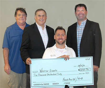 (Photo courtesy of Jennifer Queen, B&B Air Conditioning & Heating Service) (right to left) Ron Saunders, vice president of HVAC indoor air quality manufacturer, Fresh-Aire UV, Jupiter, Fla.; presented a check to injured veteran Adam Keys, a former U.S. Army paratrooper that lost three limbs in Afghanistan in 2010, via Robert Saunders, president of the veterans charity, Warrior Events, Annapolis, Md.; and Bill Williams, executive vice president at HVAC contractor, B&B Air Conditioning & Heating Service Co., Rockville, Md.