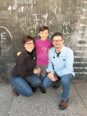 Lantz (c.) with grandparents Debbie Forcier Lynn and Jason Lynn.