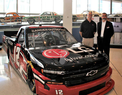In conjunction with Baker Distributing’s NASCAR sponsorship, LG Electronics USA Air Conditioning Technologies will have a primary support role in select 2019 races. Left to right: Matt Roth, Baker Distributing President, and Kevin McNamara, LG Electronics USA Senior Vice President.