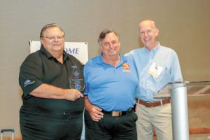 Richard and Paul Stehle of Climatic Conditioning accept the 2019 FRACCA Outstanding Company Award from Brian Hastings of FRACCA.