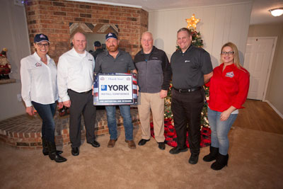 Daryl's A/C & Heating, LLC partnered with other local contractors and Building Homes for Heroes during a Welcome Home ceremony in Spring, TX for Army Sergeant Joshua Hamilton.