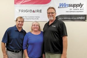 Steve McAleese of Nortek welcomed Winsupply of Tampa’s Lori and John German as new Frigidaire distributor.