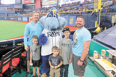 Rays mascot Raymond with Chad and Evan Greatorex, Grant Springer, Liam Greatorex and Derek Springer of Springer Brothers AC.