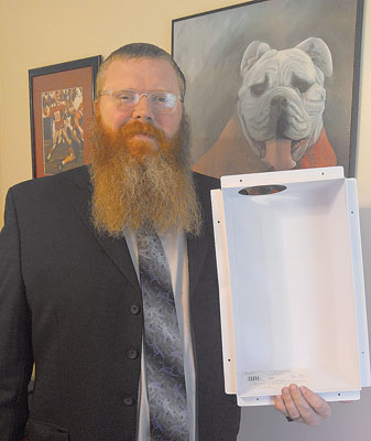 Seth Nixon of The Nixon Group showing the DBX1017FR metal dryer vent box.