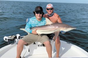 Clayton Keene Jr. (l.) won the Junior Division with a 62.5” blacktip, shown with James Brown of Brown’s AC .Clayton Keene Jr. (l.) won the Junior Division with a 62.5” blacktip, shown with James Brown of Brown’s AC.