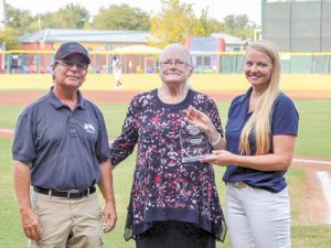 Lillie Bailey (c.) is recognized as a Bryant True Hero by Charlie Mark (l.) and Amy O’Grady (r.) of Charlie’s Tropic Heating and Air Conditioning.