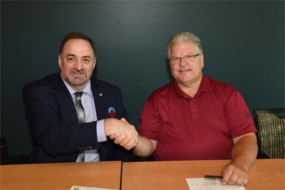 Howard Weiss (left), Executive Vice President of HVAC Excellence, with James Pavesic, Director of Education and Training, United Association. Photo courtesy of Dean Battaglia, United Association.