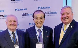 Alabama Commerce Secretary Greg Canfield, right, joins Daikin Chairman Noriyuki Inoue at the company's anniversary celebration in Decatur. On the left is Fred Denton, who headed the Alabama Development Office when Daikin first came to Decatur. Inoue led the project for Daikin at the time. (contributed)