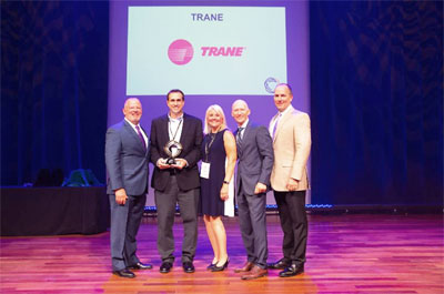 OMNIA Partners recently recognized Trane, a leading global provider of indoor comfort solutions and services and a brand of Ingersoll Rand, with its annual Horizon Award. Shown here at the awards ceremony are (left to right): Ward Brown, chief operating officer, OMNIA Partners; Jeremy Lee and Tina Bossen, Trane program managers; Ken Heckman, senior vice president of partner development, OMNIA Partners.
