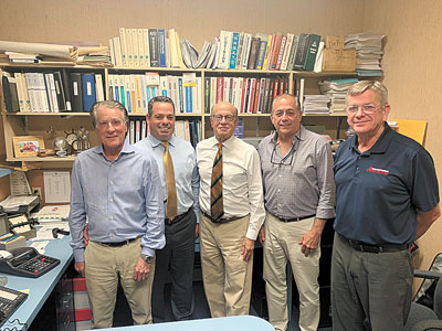 Right-left: Stanley Mickelson, William Obin, Russell Robinson, David Martin, Jim Barney.