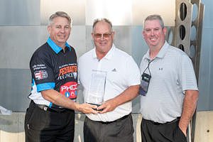 Nate Oland (left) of Federated Insurance presents the Safety Contractor of the Year to Dan (middle) and Bryan (right) Bonetti of Frank Bonetti Plumbing Inc.