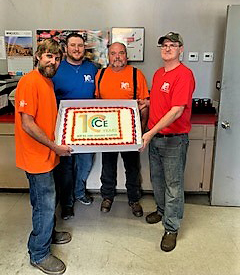 In Texarkana, celebrations included a beautifully decorated CE 10th Anniversary cake, (left to right) Ryan Blake, Zach Brown, Mark Sapaugh and Chad Cook.