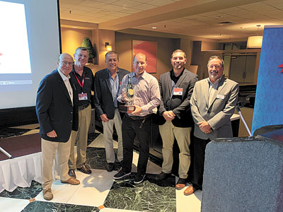 Russ Robinson, owner Robinson Supply, Jim Barney Sales Manager, Dave Martin Director of Sales, Eric Kline, President of J&J, George Marris Marketing Manager and Jay Beckley, North East Amana Factory Representative.