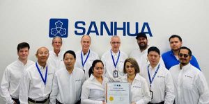Sanhua Texas Technology Center staff with accreditation certificate.