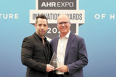 Aaron Engel (l.), Vice-President, Business Development and Chris Willette, President, with Fresh-Aire UV’s 2020 AHR Innovation Award in IAQ.