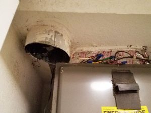 Outdoor air duct stubbed into apartment AHU plenum closet with no volume control.