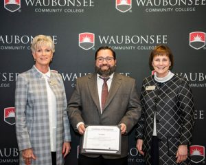 Profession Joseph Kloke of Waubonsee Community College receives CMHE certification.