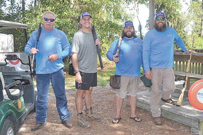 The Clay Shoot 1st place team from Tropic Aire: Jim Jones, TJ Hawk, Andy Davidson and Jimmy Jones.