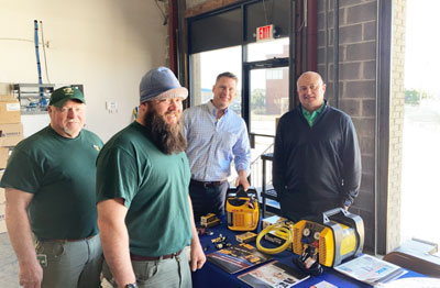 Left to right: Greg Jackson and Chad Hallmark of Fox Heating and Air Services talking to Jason Jaegers and Wayne Jolly of the Barksdale Sales Group about Mueller and Fieldpiece products at the M&A Supply open house in Birmingham.