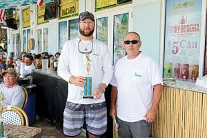 1st Place winner (29lb kingfish) Brandon Langel of Team Sea Coast Curbs with PBACCA President Jim Pickard